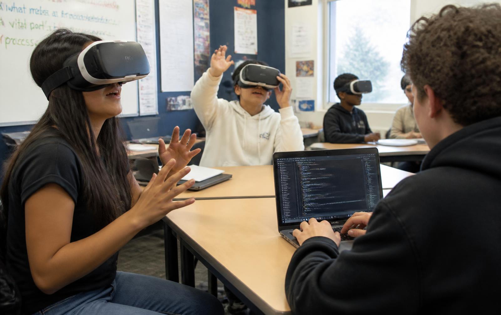 Students exploring a science lesson in virtual reality